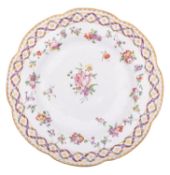 A Champion's Bristol lobed dish painted in the Sevres manner with the 'double ribbon' pattern of