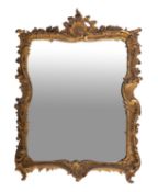 A gilt composition framed rectangular wall mirror in Rococo taste,