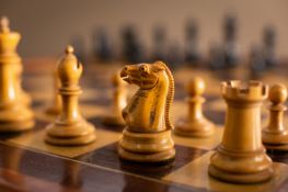 A Staunton pattern boxwood and ebony chess set, by Jaques & Son Ltd, London