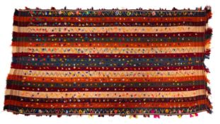 A Jayim Kelim, the striped field in cream, orange, wine and green colours, 215cm x 130cm.