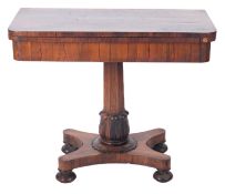 An early Victorian rosewood rectangular card table, the baize lined hinged top with rounded corners,
