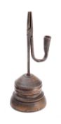 A George III wrought iron and stained wood mounted rushnip,