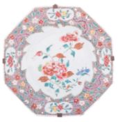 A Chinese famille rose octagonal plate painted with a central peony spray,