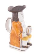 A small pearlware toby jug in Pratt colours and another of Portobello type the first wearing an