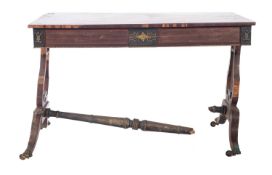 A Regency mahogany banded and gilt brass mounted rectangular library table,