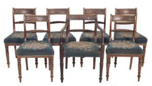 A set of six Regency mahogany dining chairs,
