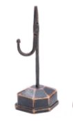 A George III wrought iron and ebonised wood mounted rushnip,