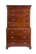 A George III mahogany chest on chest, the upper part with a moulded dentil cornice,