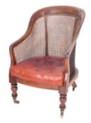 A Regency mahogany and canework library bergere,