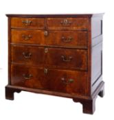An early 18th Century walnut and crossbanded rectangular chest,