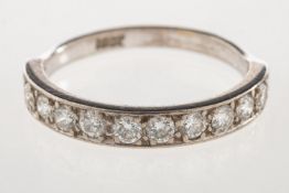 A diamond half eternity ring, set with t