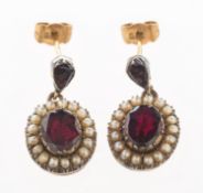 A pair of garnet and pearl drop earrings