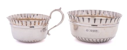 A Victorian silver cream jug and sugar b