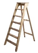Wooden step ladder.