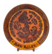 John Pollex [b 1941] a large terracotta charger,