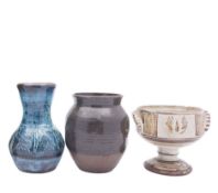 *Michael Cardew [1901-1983] three pieces of stoneware, comprising an oviform vase under brown glaze,