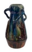 A Torhout [Flemish] art pottery vase of garlic-shaped form with three asymmetric handles embossed