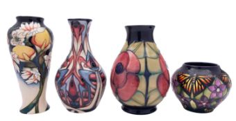 Four Moorcoft pottery vases,