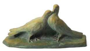 After Joseph d''Aste (1881-1945), a Continental painted terracotta group of pigeons,