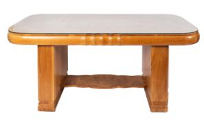 A walnut dining suite comprising table and six chairs, in Art Deco style,
