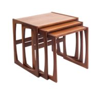 Ercol, a nest of three rectangular elm tables, circa 1960s, the largest 53cm x 43cm