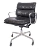 A black leather and alloy office chair in the style of a Herman Miller Eames Vitra EA 217 chair,