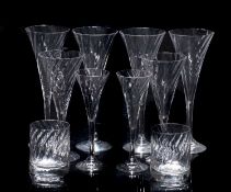 A suite of Orrefors Helena wrythen moulded trumpet shaped glasses,