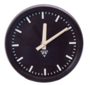 A 20th century Czechoslovakian Brown Bakelite Industrial wall clock by Pragotron,
