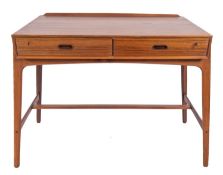 A Danish morado wood (machaerium scleroxylon) desk, designed by Svend Aage Madsen for Sigurd Hansen,