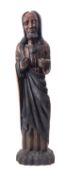 A Continental, probably Spanish carved and stained walnut figure,
