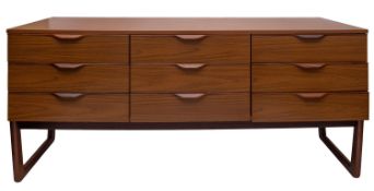A Europa Furniture teak dressing table and two matching wardrobes,