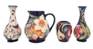 Three Moorcroft pottery vases and a jug, comprising Never Before after Emma Bossons,