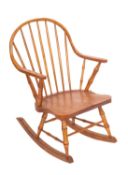 Jeromy Rowett, (Contemporary). An ash and elm rocking chair, No. 39.