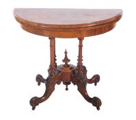 A Victorian walnut and inlaid half round