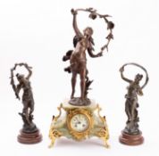 A French spelter and onyx figural clock