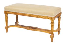 A carved giltwood and upholstered long s