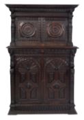 A Victorian carved oak side cabinet in R