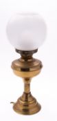 A brass oil lamp with acid etched opaque