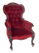 A Victorian carved mahogany armchair, wi