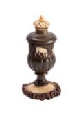 A Continental carved antler spice box in