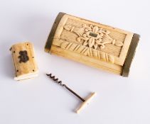 A 19th century carved bone snuff box, a