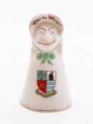 A Carlton China crested ware suffragette table bell,