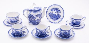 A Ridgways pottery Child's tea service printed in the Humphreys Clock pattern with scenes from