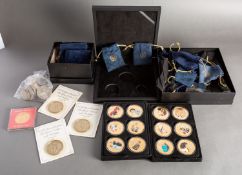 A collection of modern boxed medallions