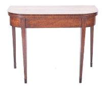 An early 19th Century mahogany and inlai