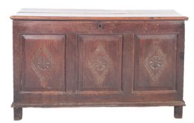 An oak coffer, early 18th century; the h
