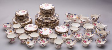 An extensive Aynsley porcelain dinner and tea service printed with roses and other garden flowers