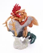 An Algora Madrid porcelain figure of a c