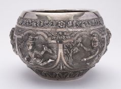 A Burmese silver rice bowl, late 19th or early 20th century, of globular form,