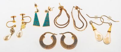 A mixed group of earrings, including a pair of tri-coloured hoop earrings with textured finish,
